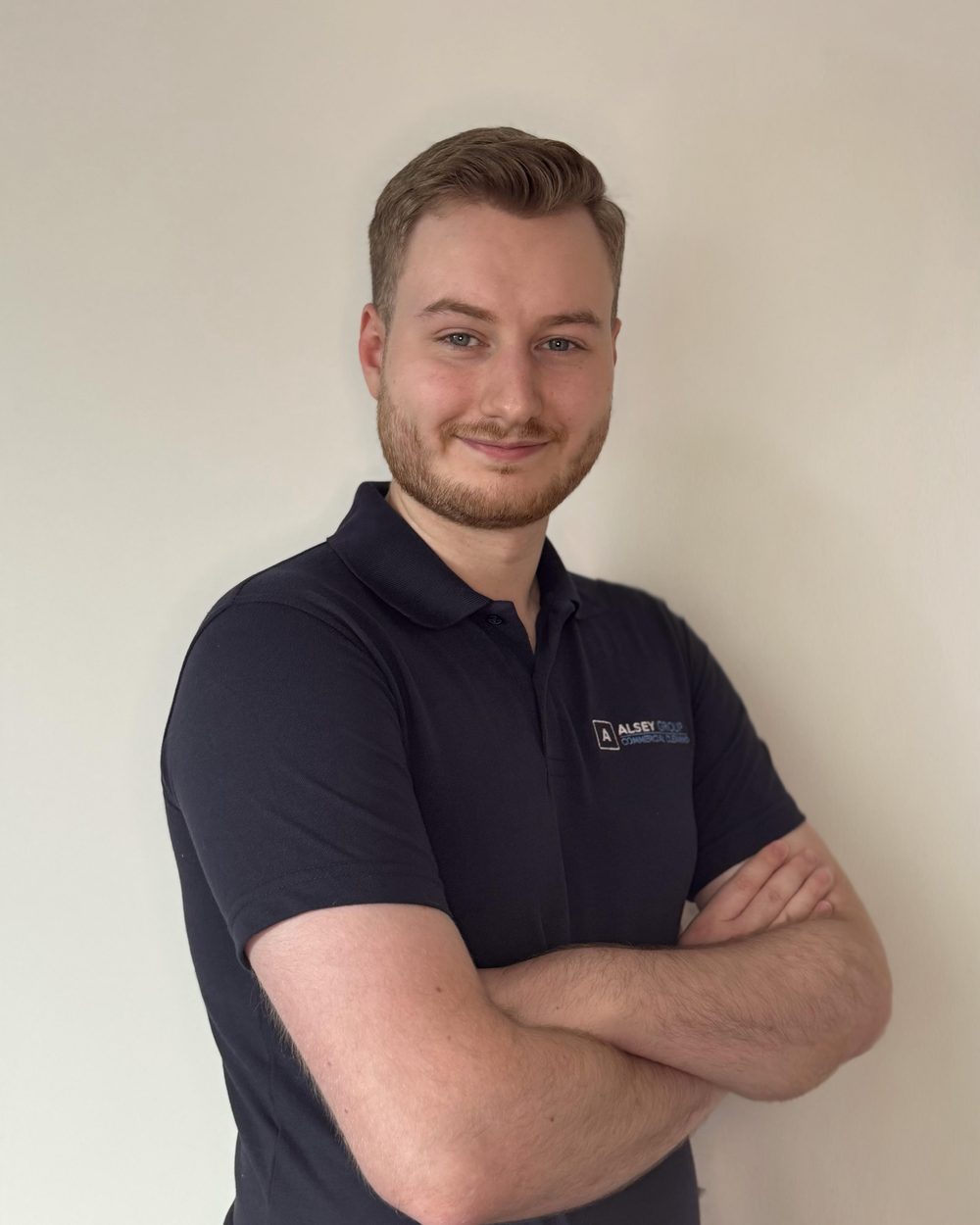 Sam Alsey, Managing Director of Alsey Group, in a branded Alsey Group polo shirt